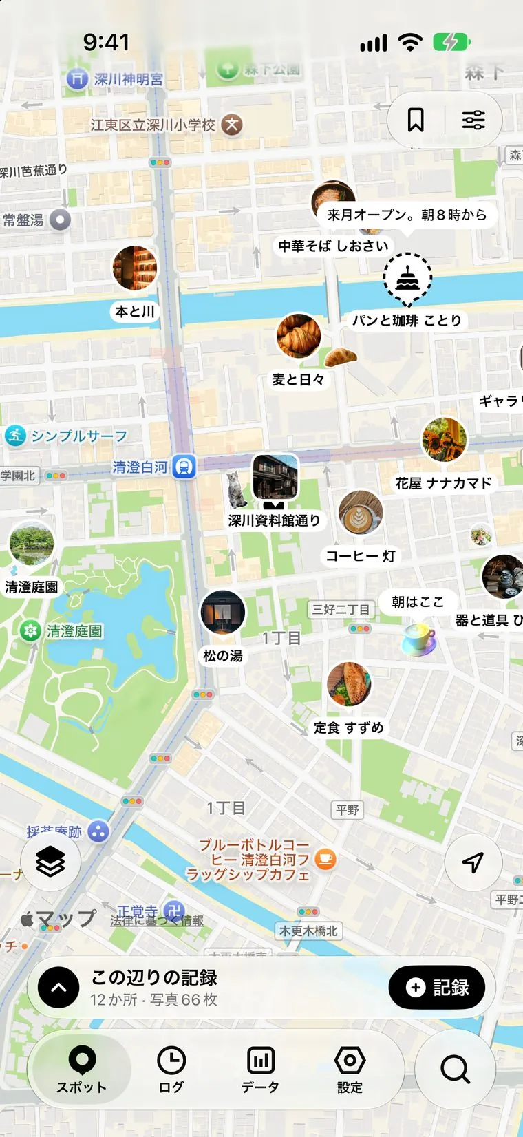 スポットタブ。写真つきのピンが並ぶ地図の下に「この辺りの記録」と「記録」ボタン、いちばん下にタブと検索のボタンがある